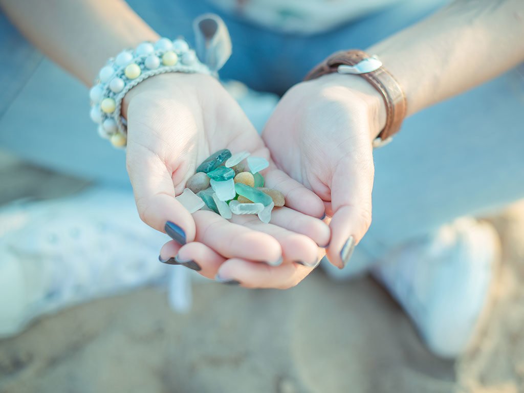 Girl holding sea glass