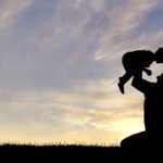 mother and child in sunset