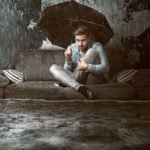 Man in rain umbrella