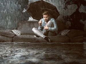 Man in rain umbrella