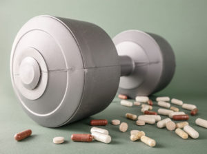 Barbell and pills