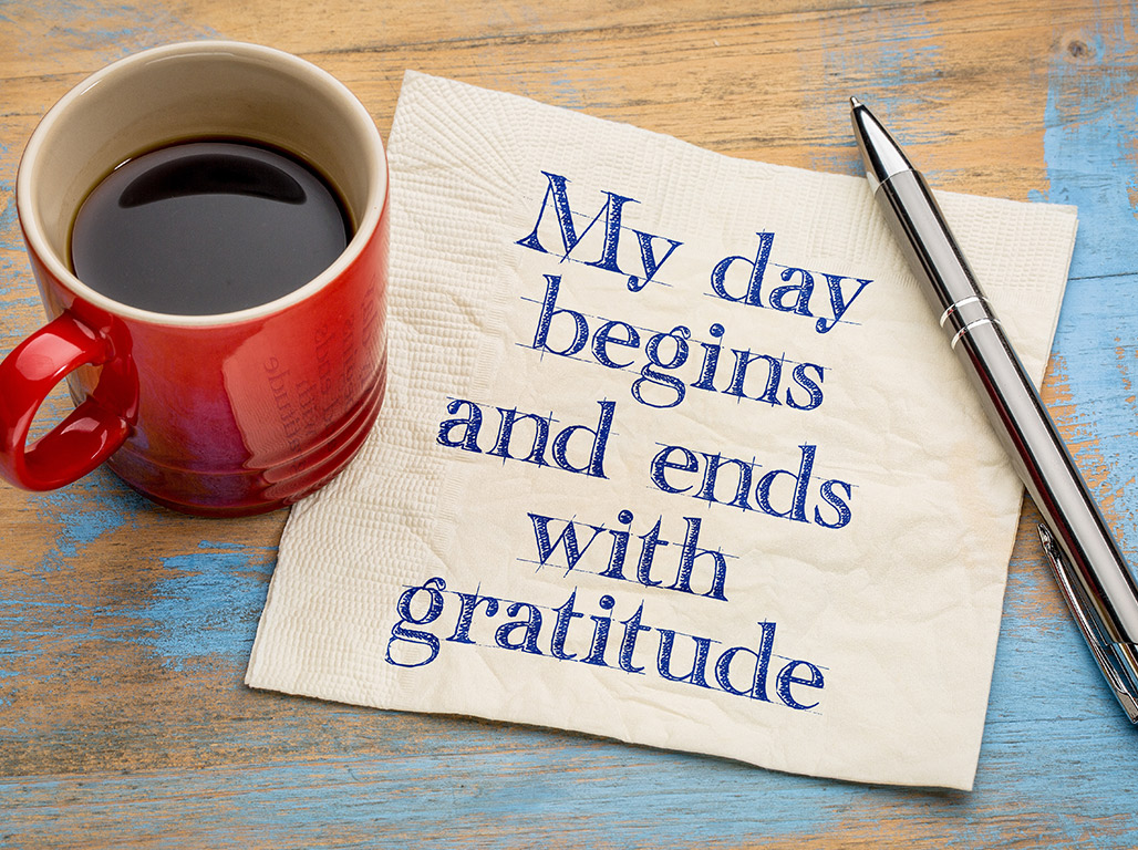 cup of coffee and napkin My day begins and ends with gratitude