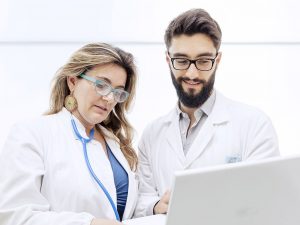 Doctors reviewing patient chart