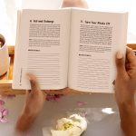 100 tips for growing up woman reading in bathtub