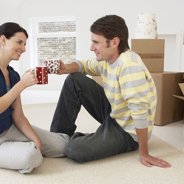 Couple moving boxes