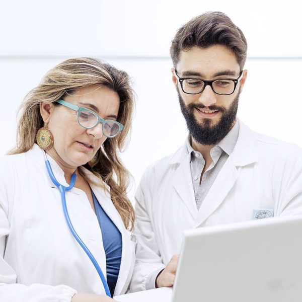 Doctors reviewing patient chart
