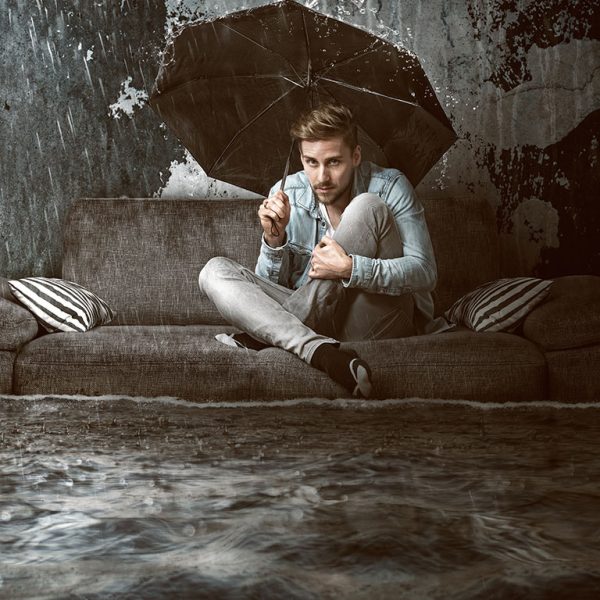 Man in rain umbrella